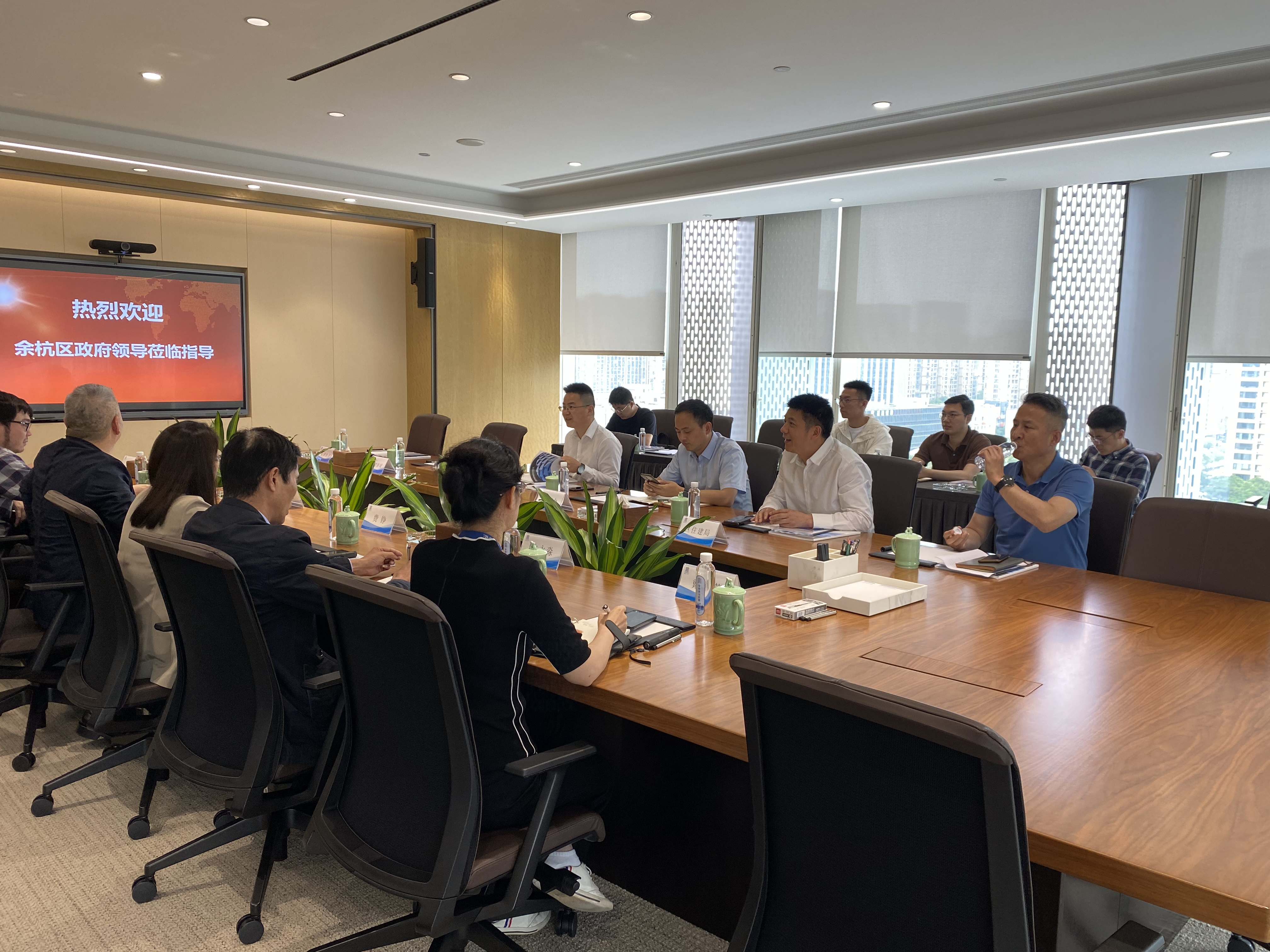 余杭区领导带队赴华和建设集团走访调研